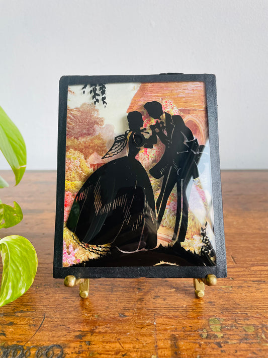 Mini Reverse Painted Silhouette Lithograph Picture on Convex Bubble Glass - Courting Couple Holding Hands in Cottage Garden