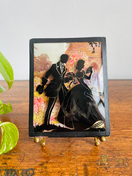 Mini Reverse Painted Silhouette Lithograph Picture on Convex Bubble Glass - Man Bringing Flowers in Cottage Garden