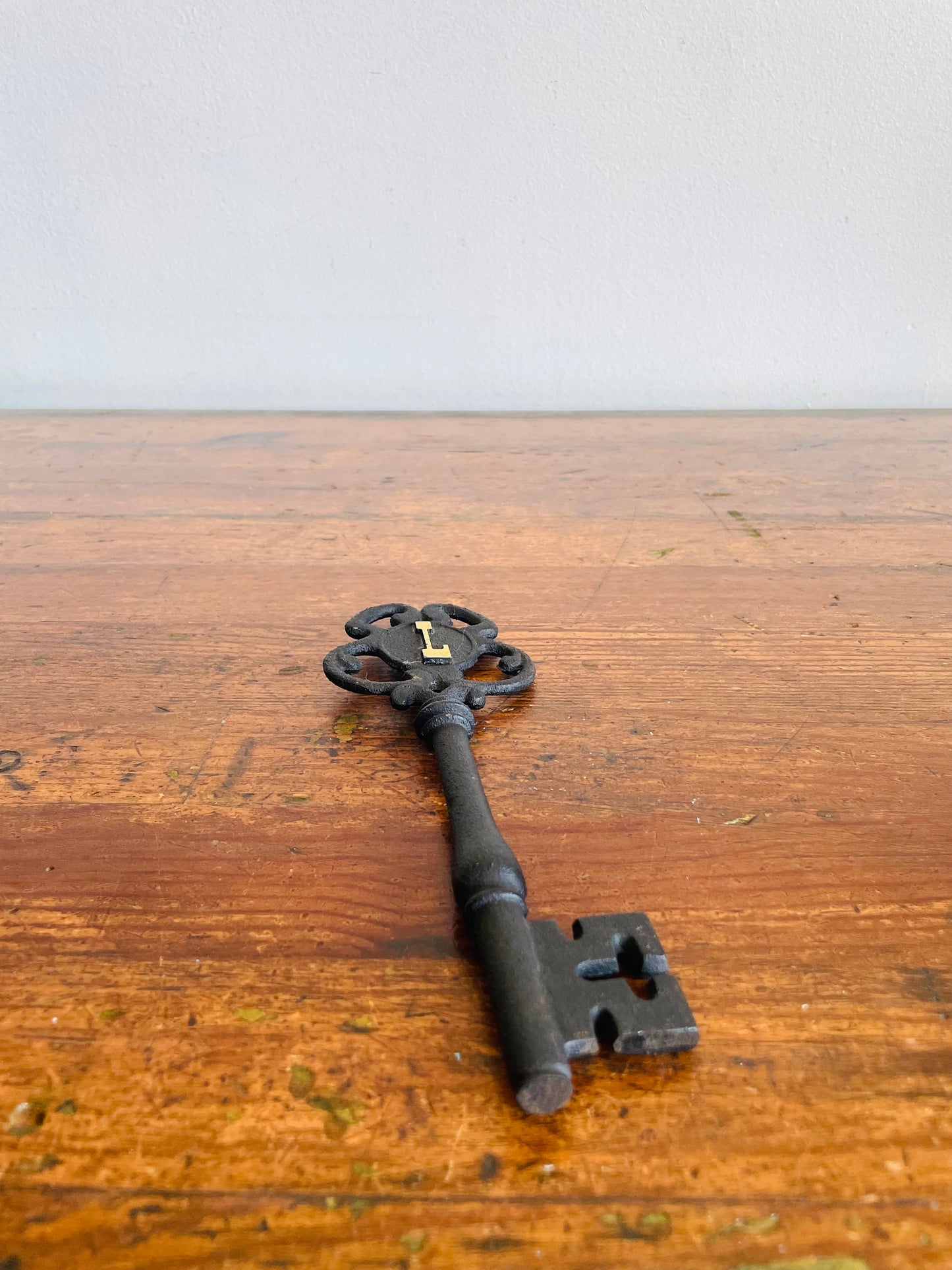 Large Black Cast Iron Skeleton Key Monogrammed with a Gold Letter L