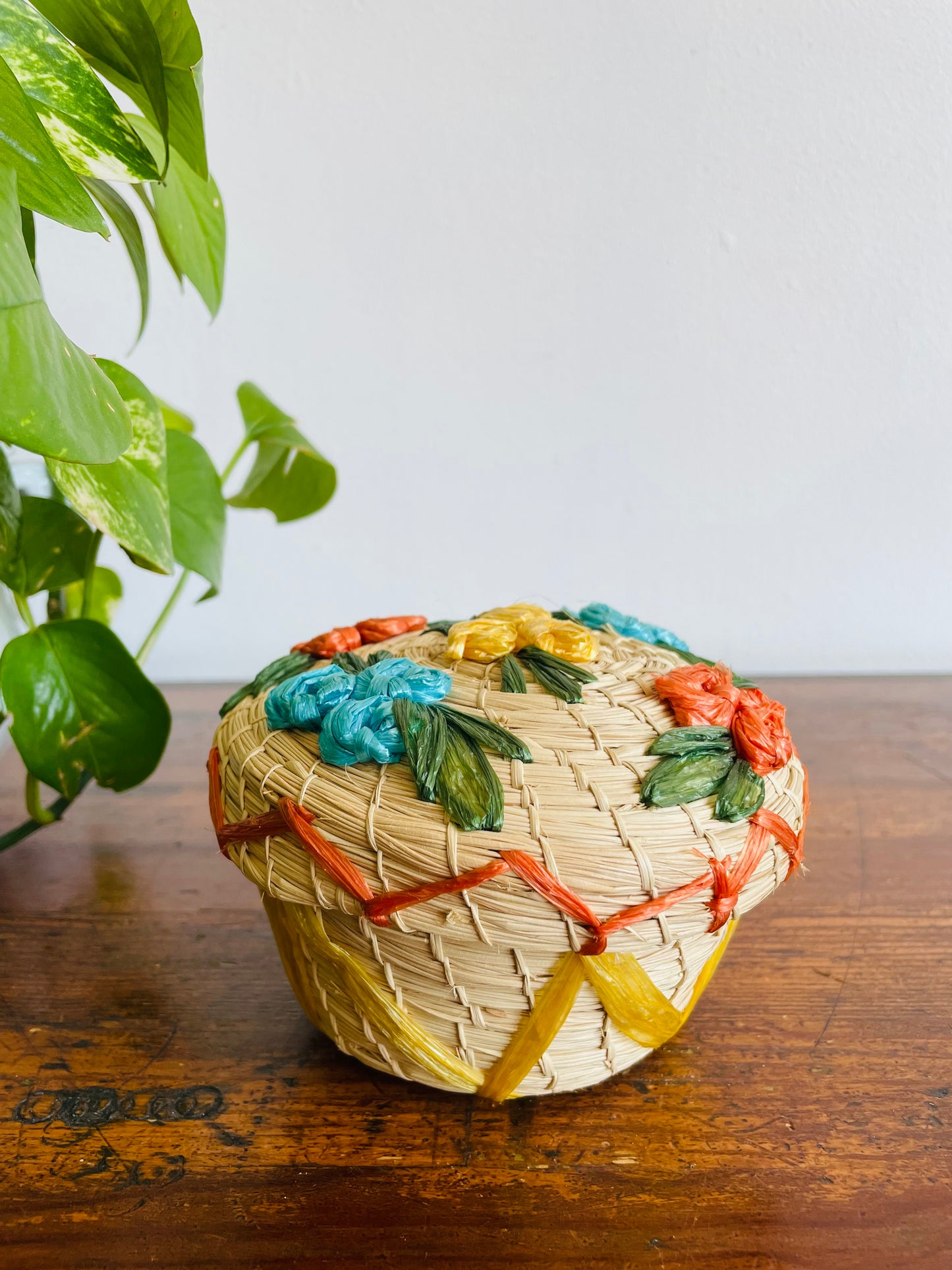 Mini Round Woven Straw Basket with Raffia Flower Design