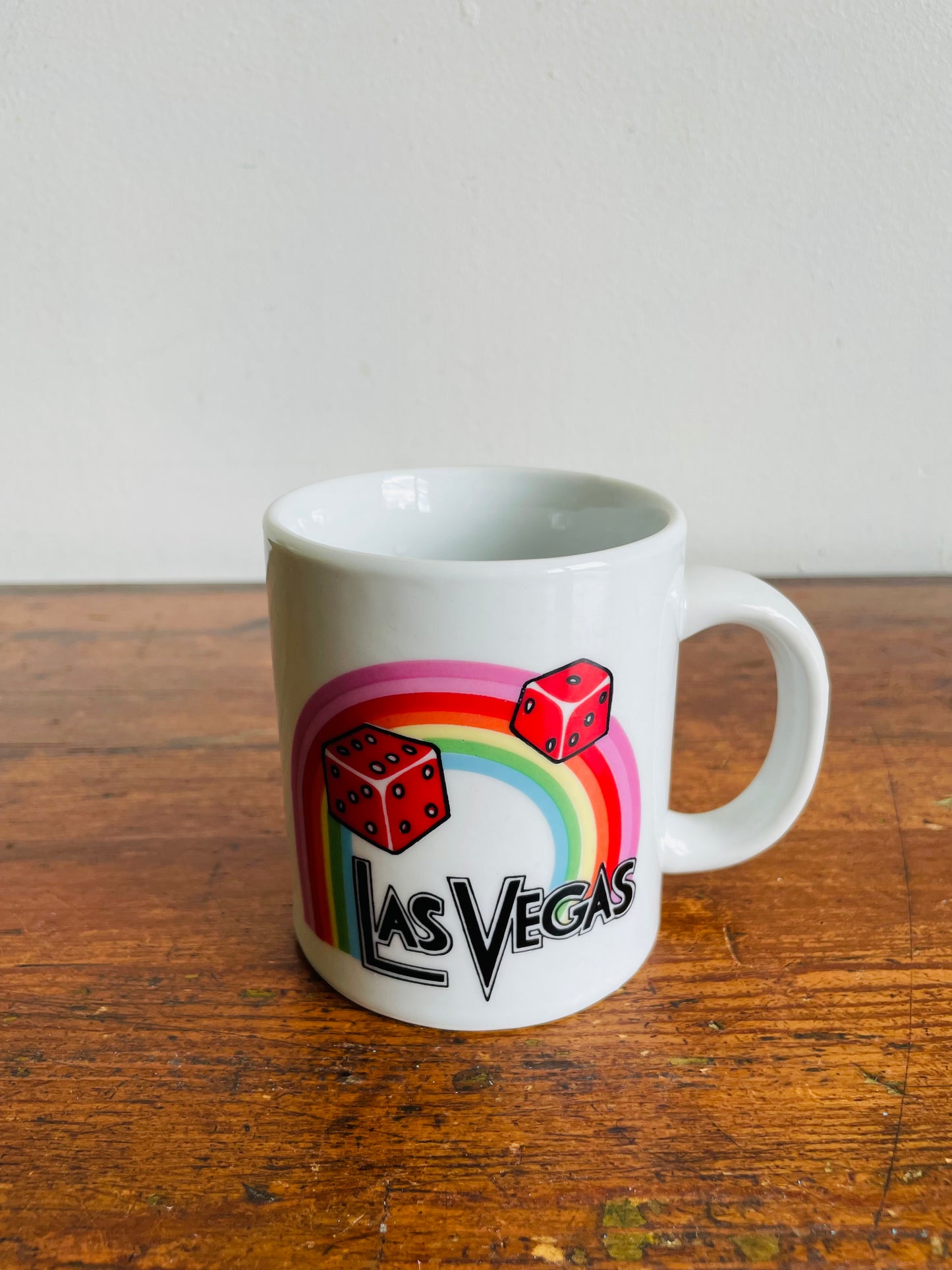 White Las Vegas Mug with Rainbow & Red Dice Graphic