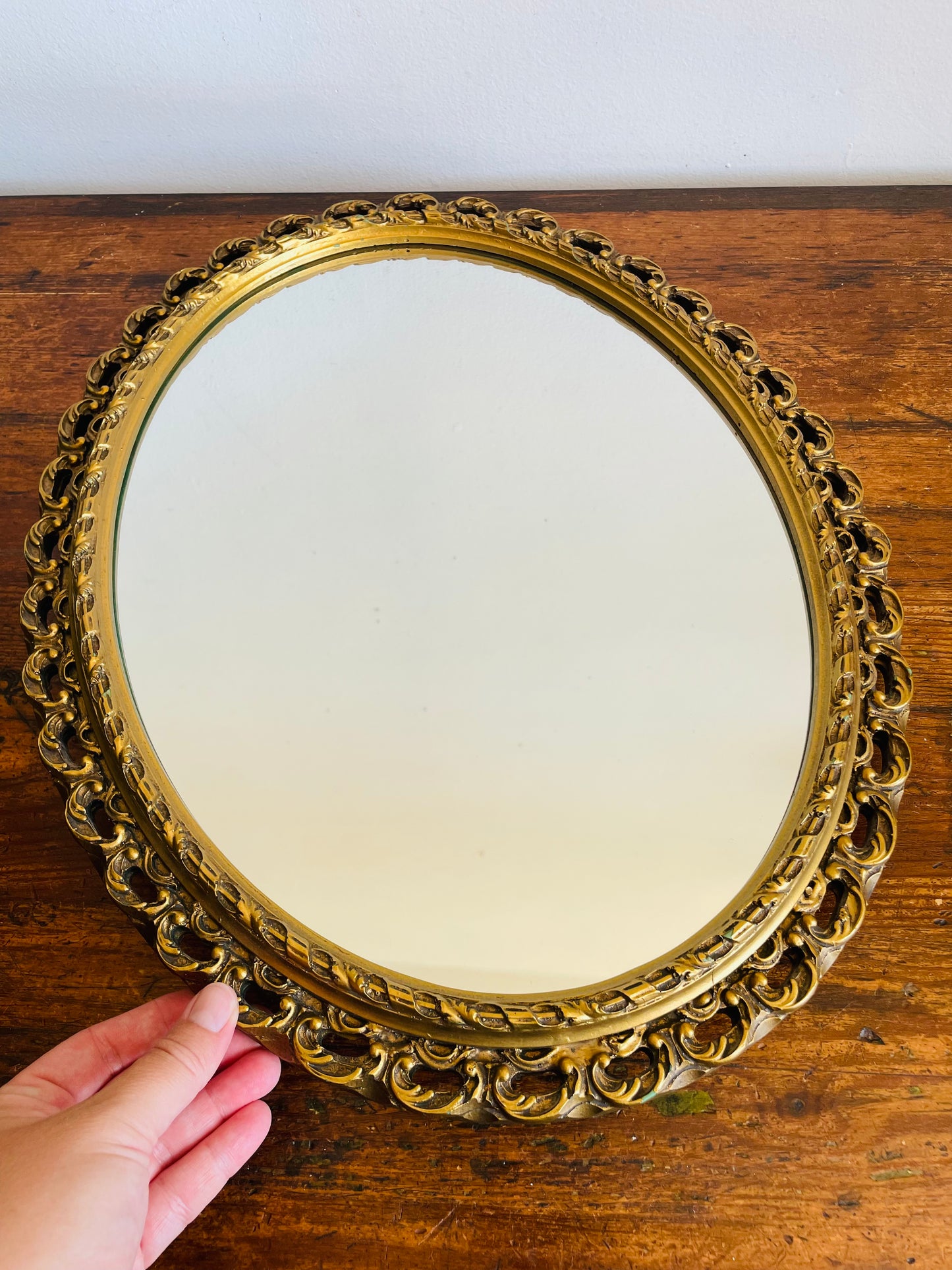 Oval Mirror with Ornate Gold Filigree Design
