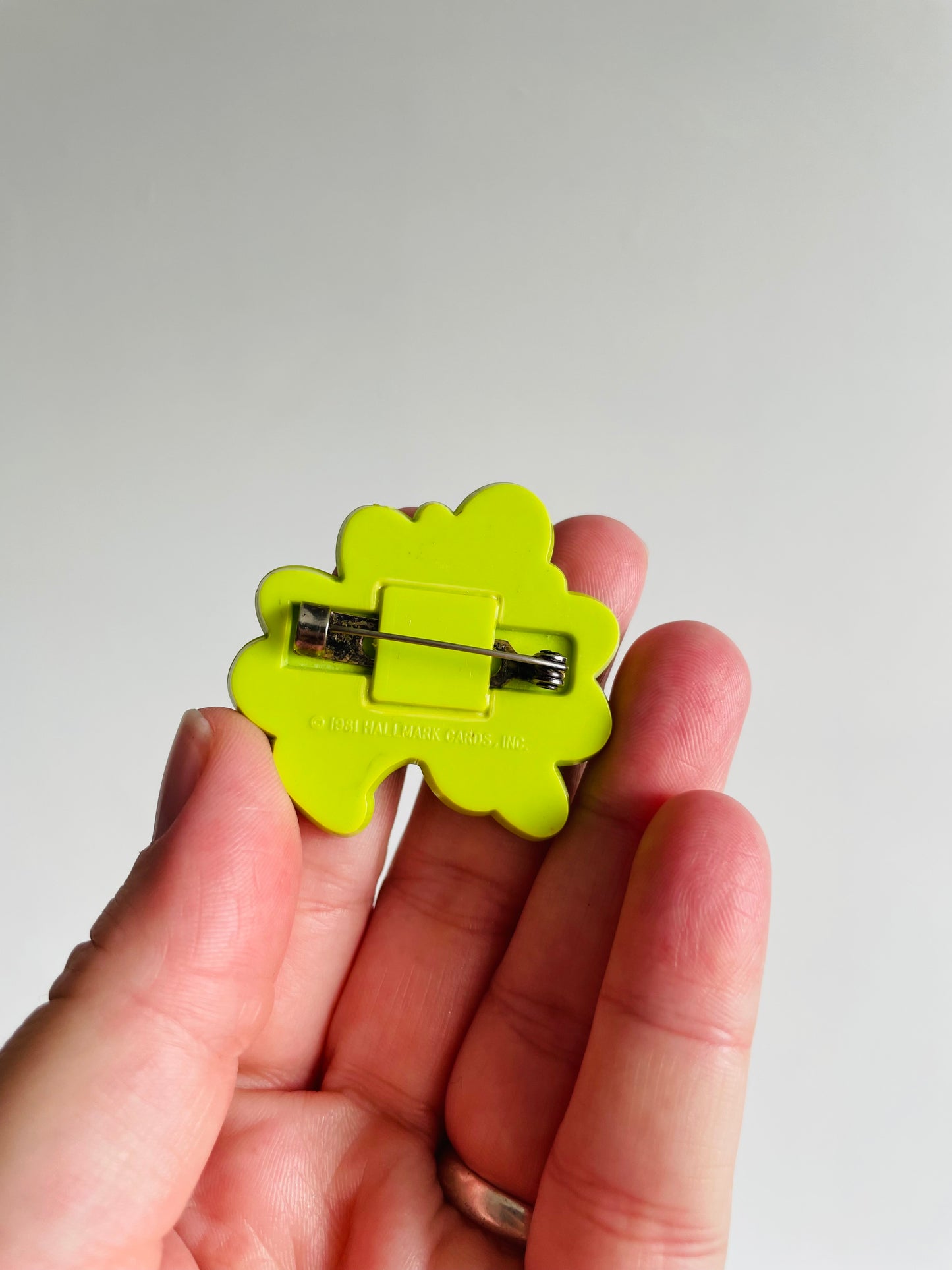 St. Patrick's Day Holiday Pin - Cheerful Shamrock Running - Hallmark Cards Inc. 1981