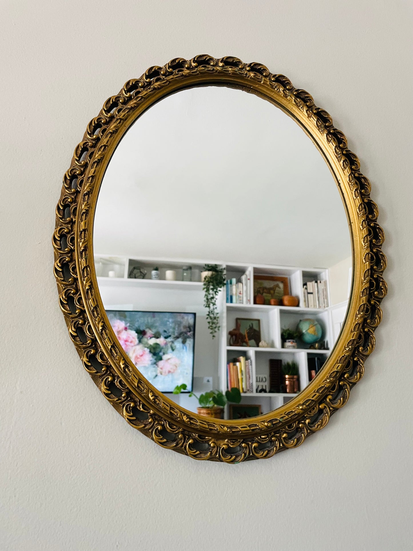 Oval Mirror with Ornate Gold Filigree Design