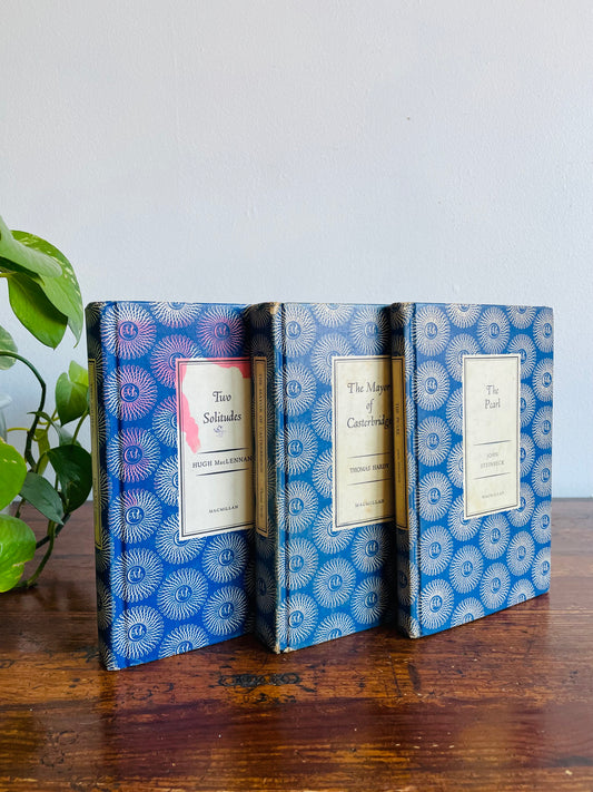 MacMillan Blue Hardcover Book Bundle - The Pearl by John Steinbeck (1958), Two Solitudes by Hugh MacLennan (1951), & The Mayor of Casterbridge by Thomas Hardy (1962)
