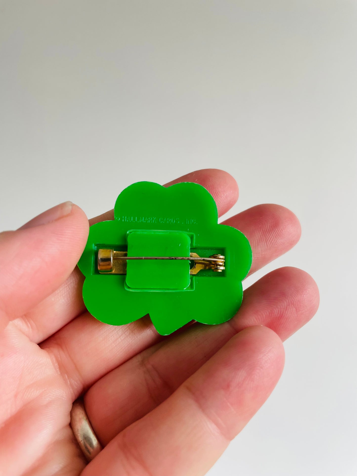 St. Patrick's Day Holiday Pin - Smiley Face Shamrock - Hallmark Cards Inc.