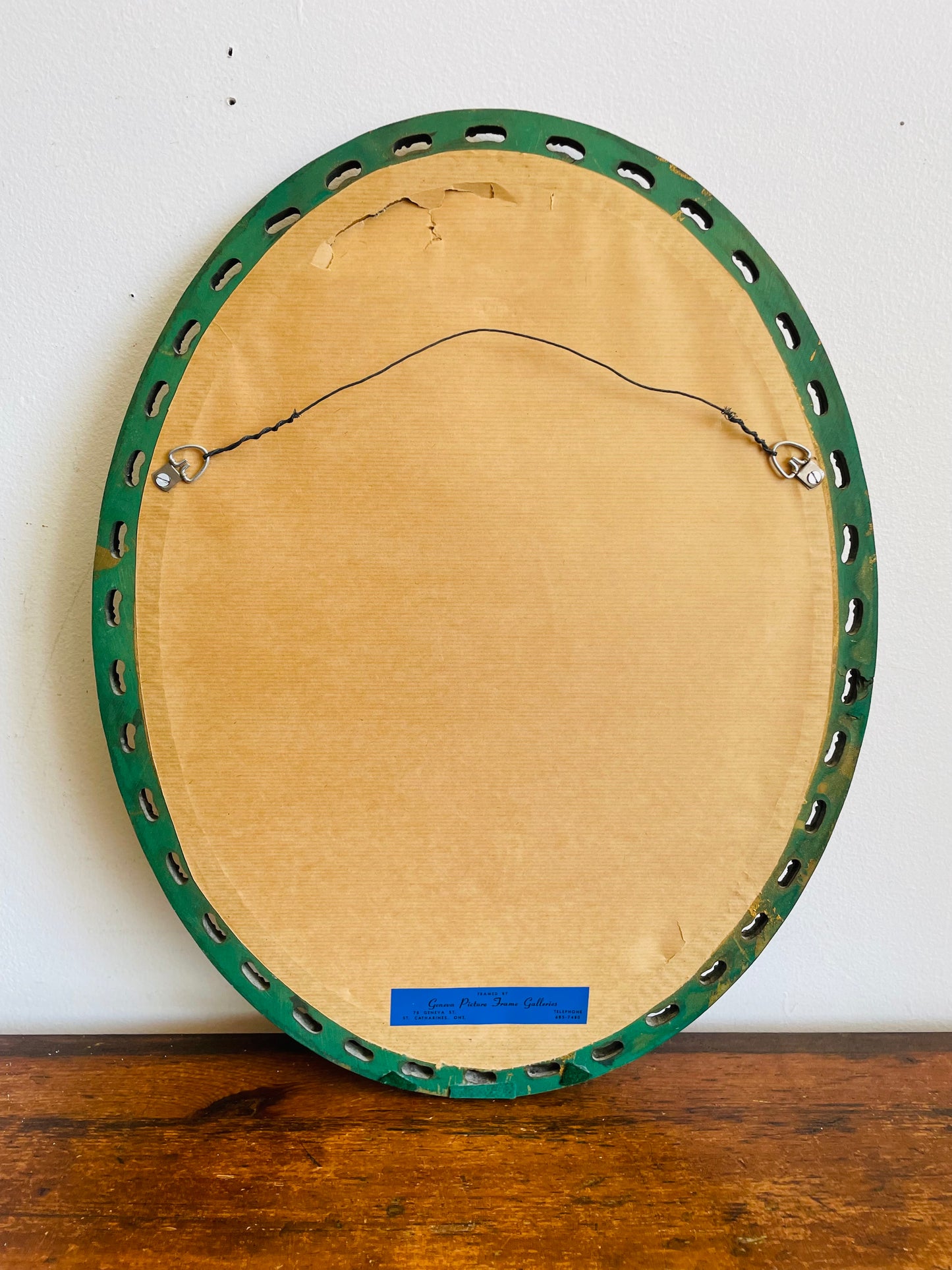 Oval Mirror with Ornate Gold Filigree Design