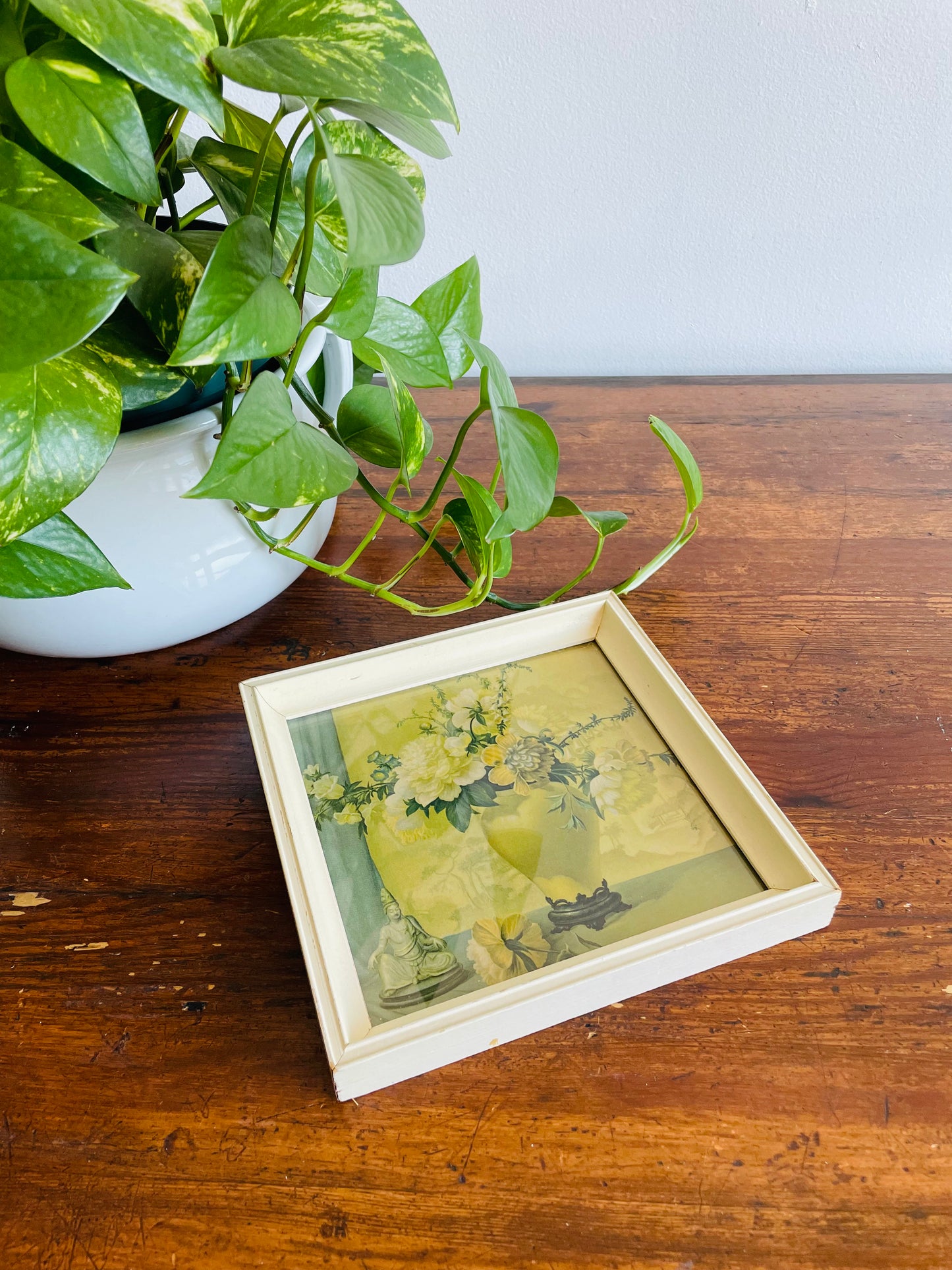 Muted Colours Floral Still Life Framed Print - White Flowers in Vase & Religious Statue