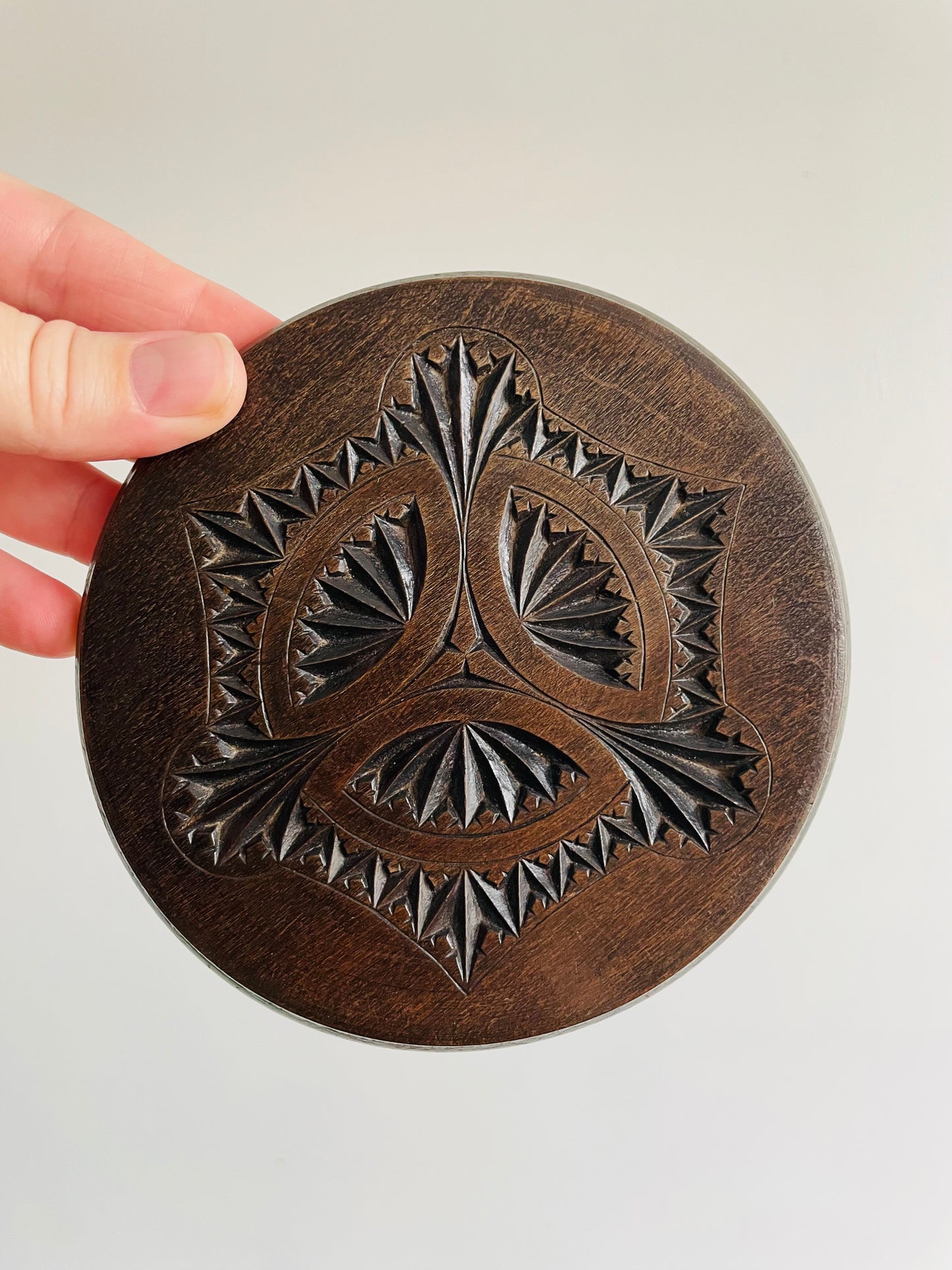 Miniature Wooden Plate with Intricately Carved Design