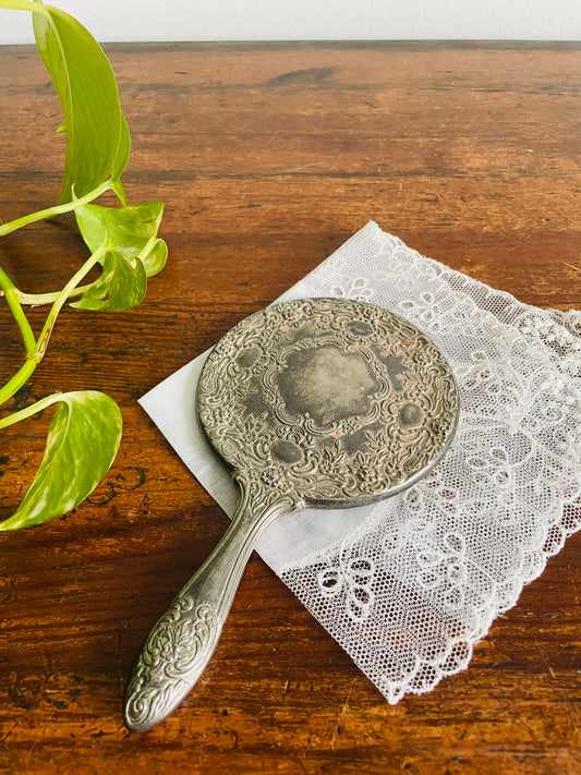 Heavy Round Silver Plate Handheld Vanity Mirror with Ornate Floral Design