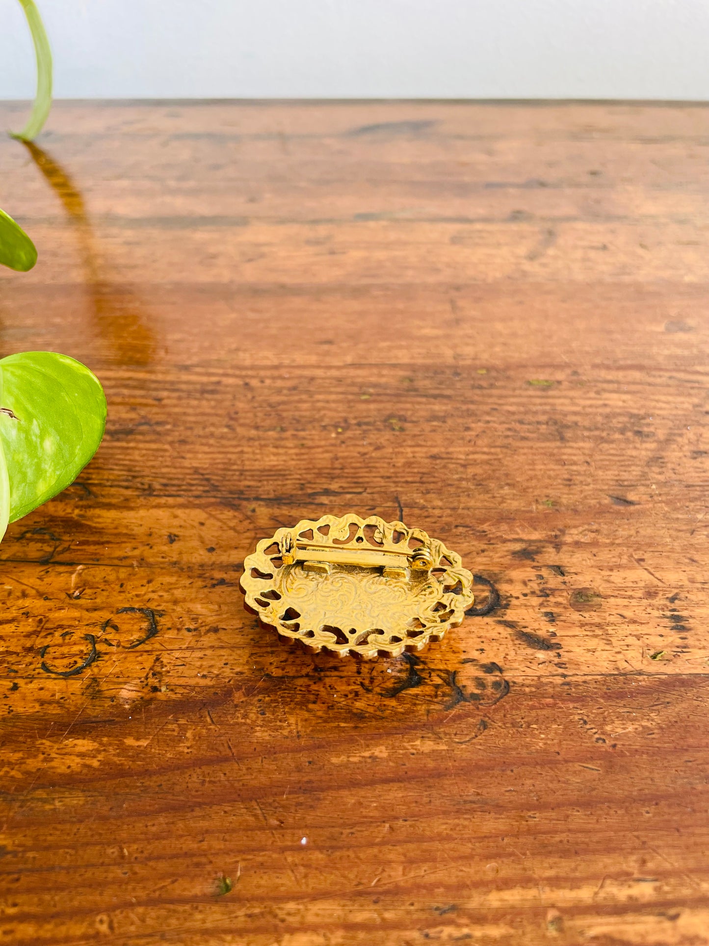 Oval Brass & Faux Pearl Brooch with Swirl Design