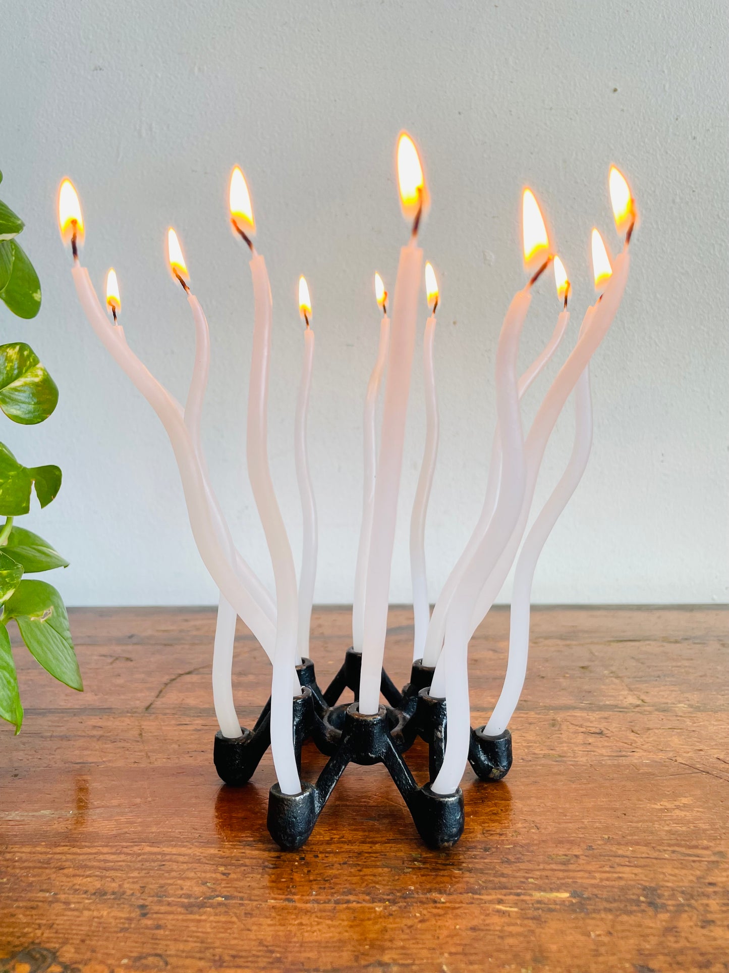 Vintage Mid-Century Modern Black Cast Iron Spider Atomic Starburst Candle Holder for 12 Slim Tapers - Made in Japan