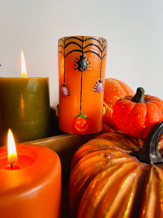 Orange Halloween Candle with Spiders, Web & Jack-o-Lanterns