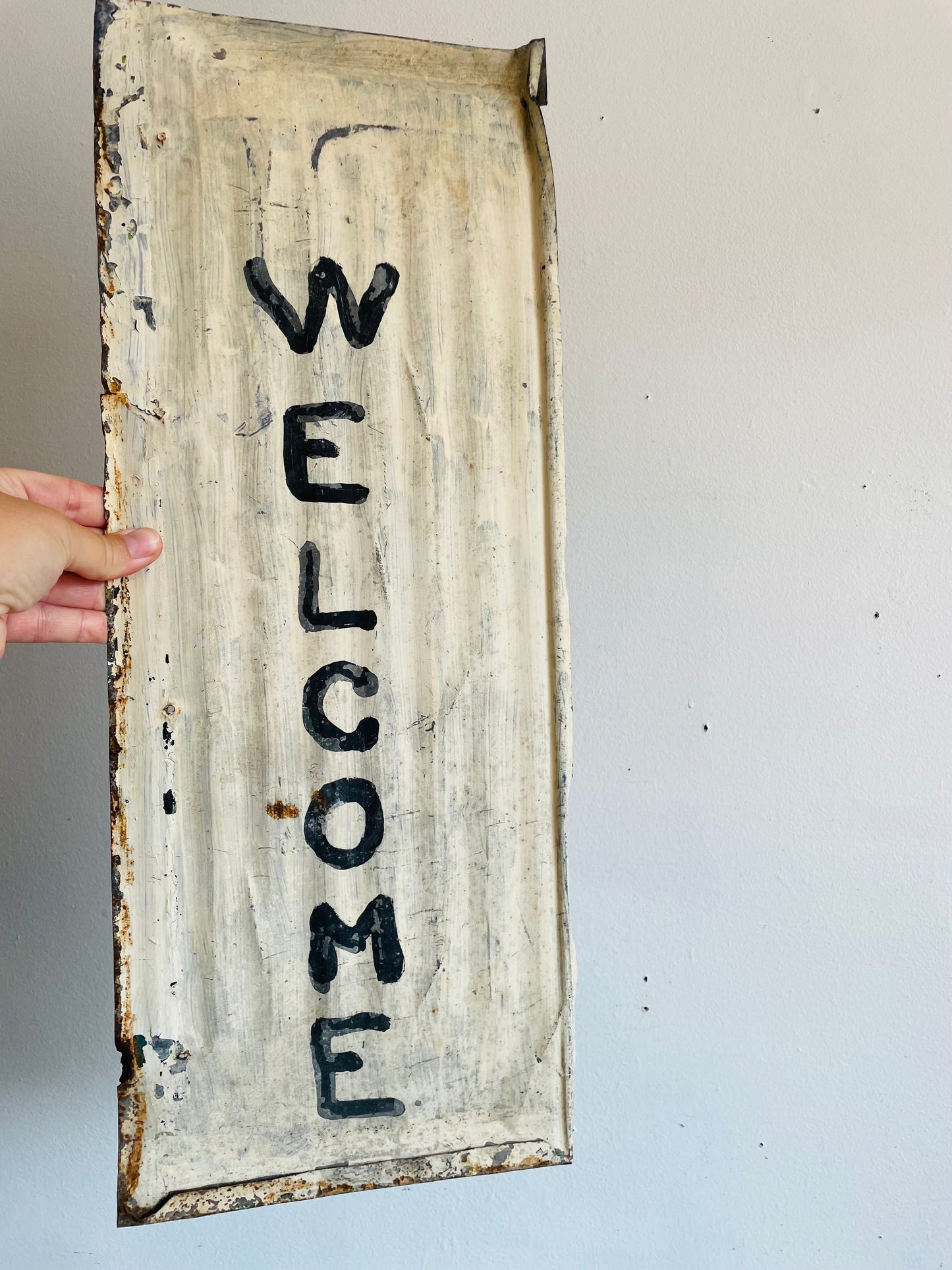 Rustic Hand Painted White & Black Welcome Sign on Metal Background