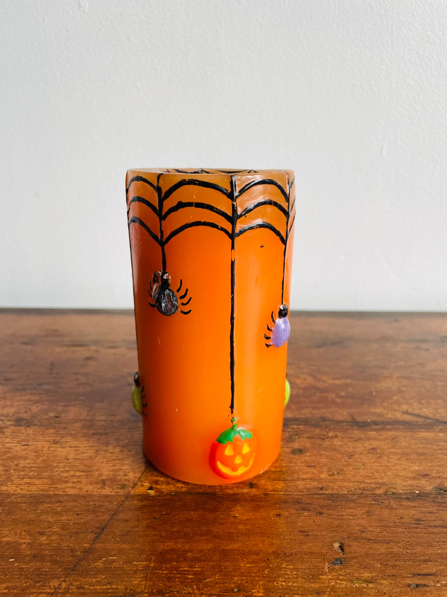 Orange Halloween Candle with Spiders, Web & Jack-o-Lanterns