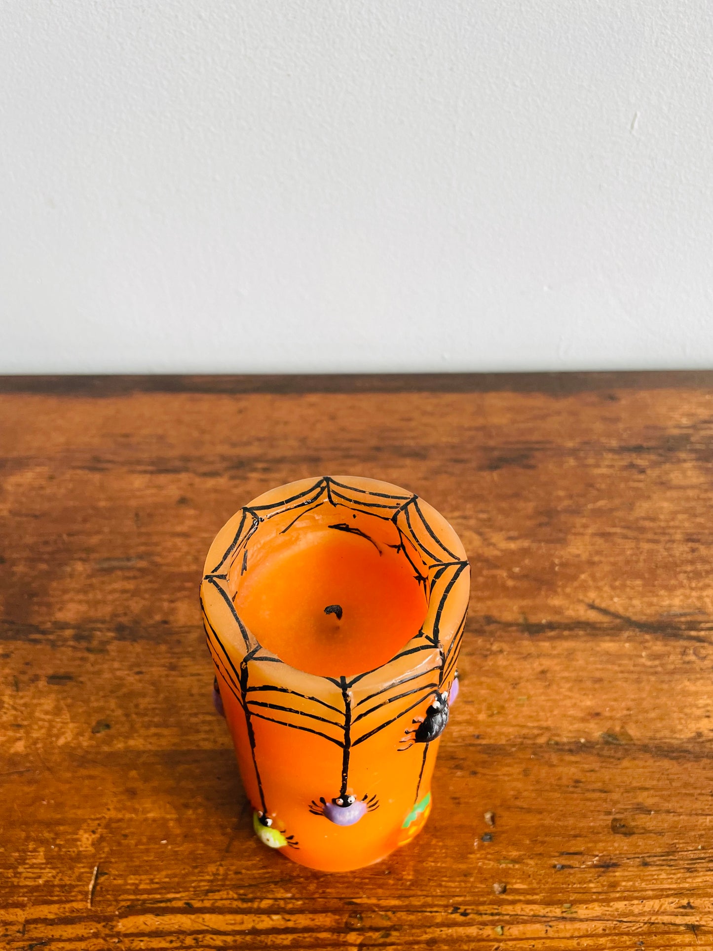 Orange Halloween Candle with Spiders, Web & Jack-o-Lanterns