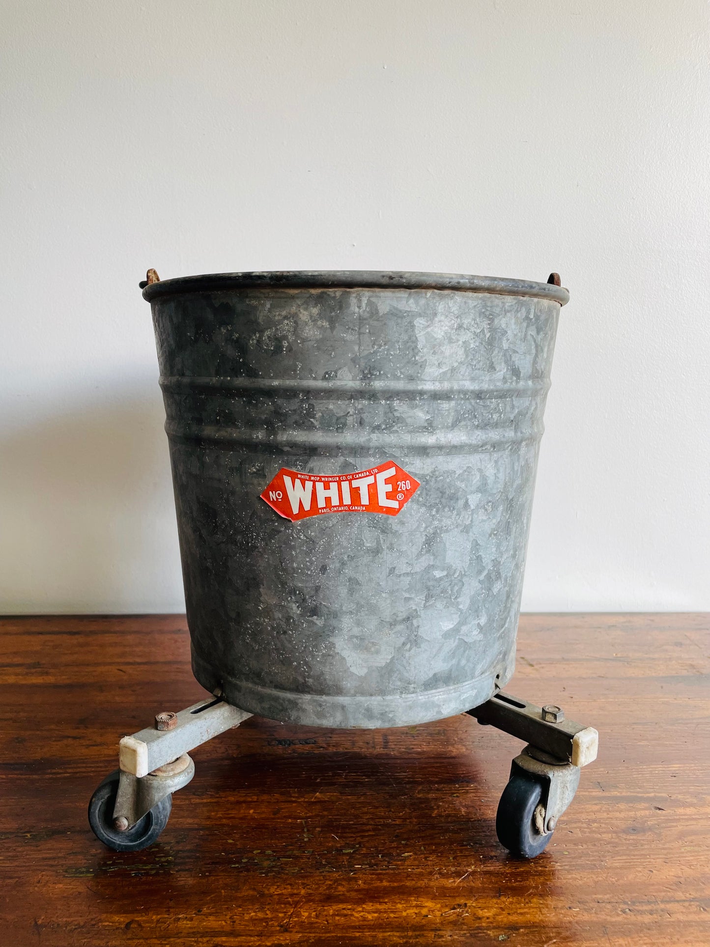 Rustic Galvanized Steel Mop Bucket on Caster Wheels with Handle - White Mop Wringer Co. of Canada - Paris, Ontario