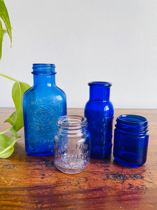 Instant Collection of Cobalt Blue & Clear Medicinal Glass Bottles - Set of 4 - Milk of Magnesia, Bromoseltzer, Vaseline & Vicks