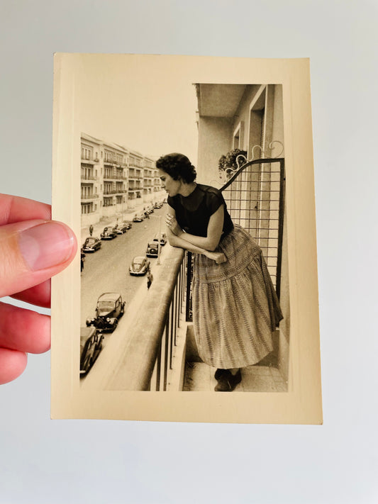 Black & White Photograph of Woman on Balcony - Found in Lisbon, Portugal