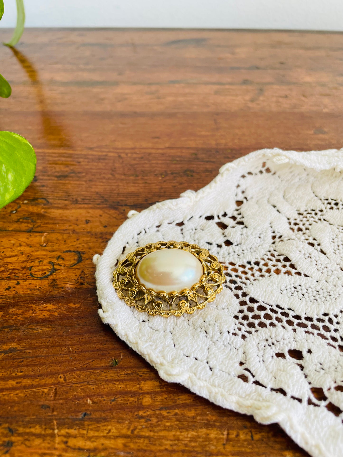 Oval Brass & Faux Pearl Brooch with Swirl Design