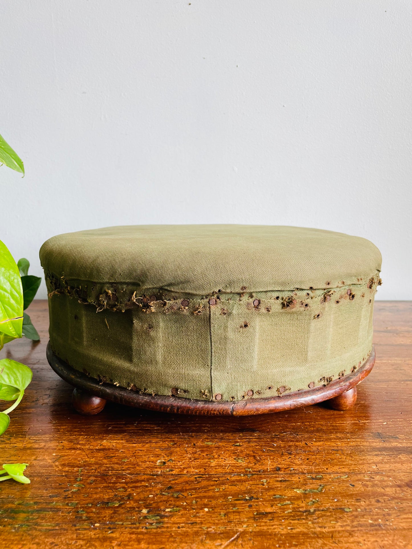 Antique Round Green Straw Stuffed Footstool with Solid Wood Base & Knob Feet