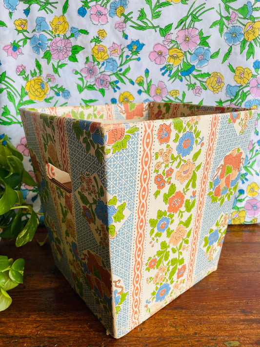Retro Cardboard Box Trash Can with Flower Pattern Design - Used to Collect Fabric Scraps in a Sewing Crafting Room