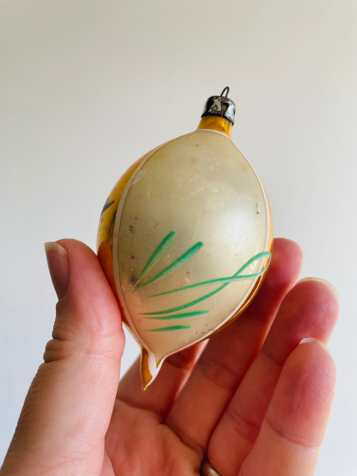 Yellow & White Glass Ornament with Flower Design