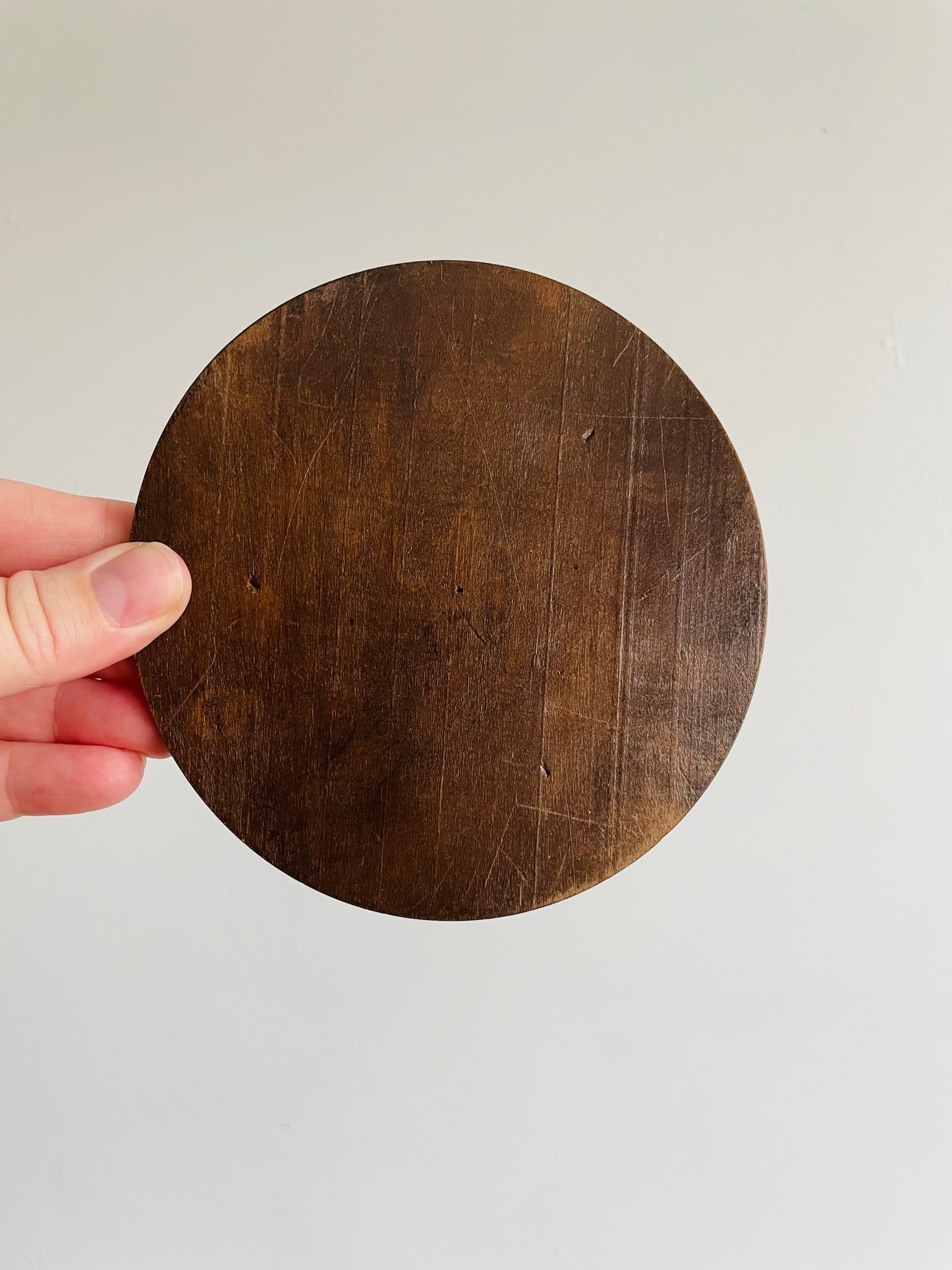 Miniature Wooden Plate with Intricately Carved Design