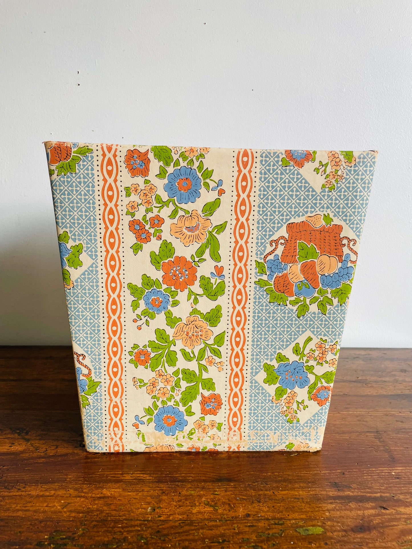 Retro Cardboard Box Trash Can with Flower Pattern Design - Used to Collect Fabric Scraps in a Sewing Crafting Room