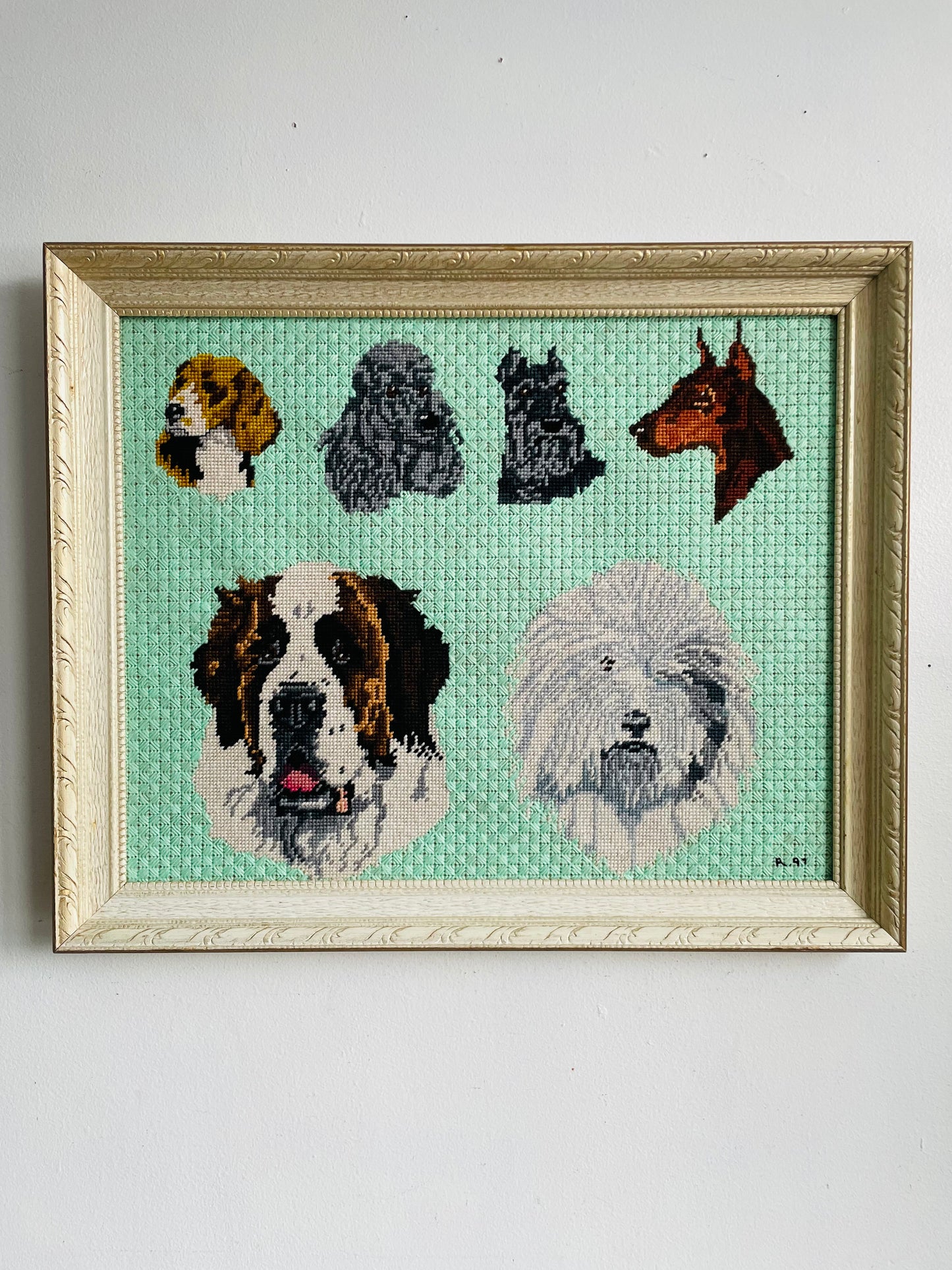 Vintage 1997 Adorable Needlepoint Embroidery Picture of Dog Breeds on Seafoam Green Background in Wood Frame - Beagle, Poodle, Schnauzer, Doberman, St. Bernard & Sheepdog