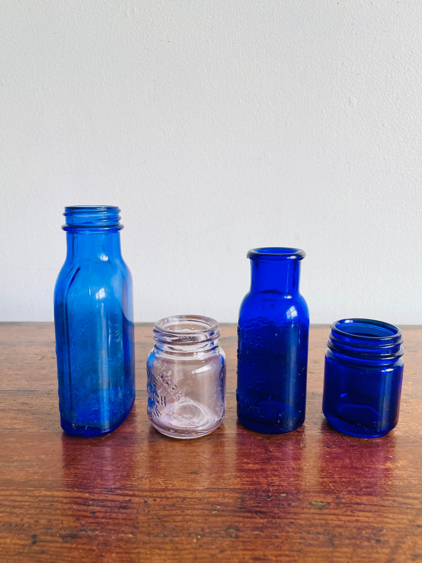 Instant Collection of Cobalt Blue & Clear Medicinal Glass Bottles - Set of 4 - Milk of Magnesia, Bromoseltzer, Vaseline & Vicks