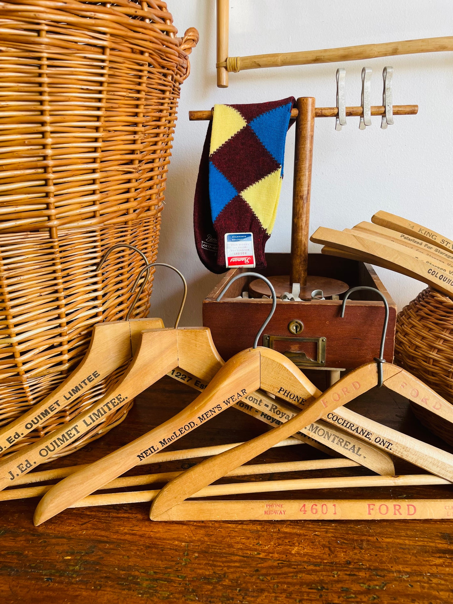 Instant Collection of 12 Wood & Metal Clothes Hangers Stamped with Advertising Slogans