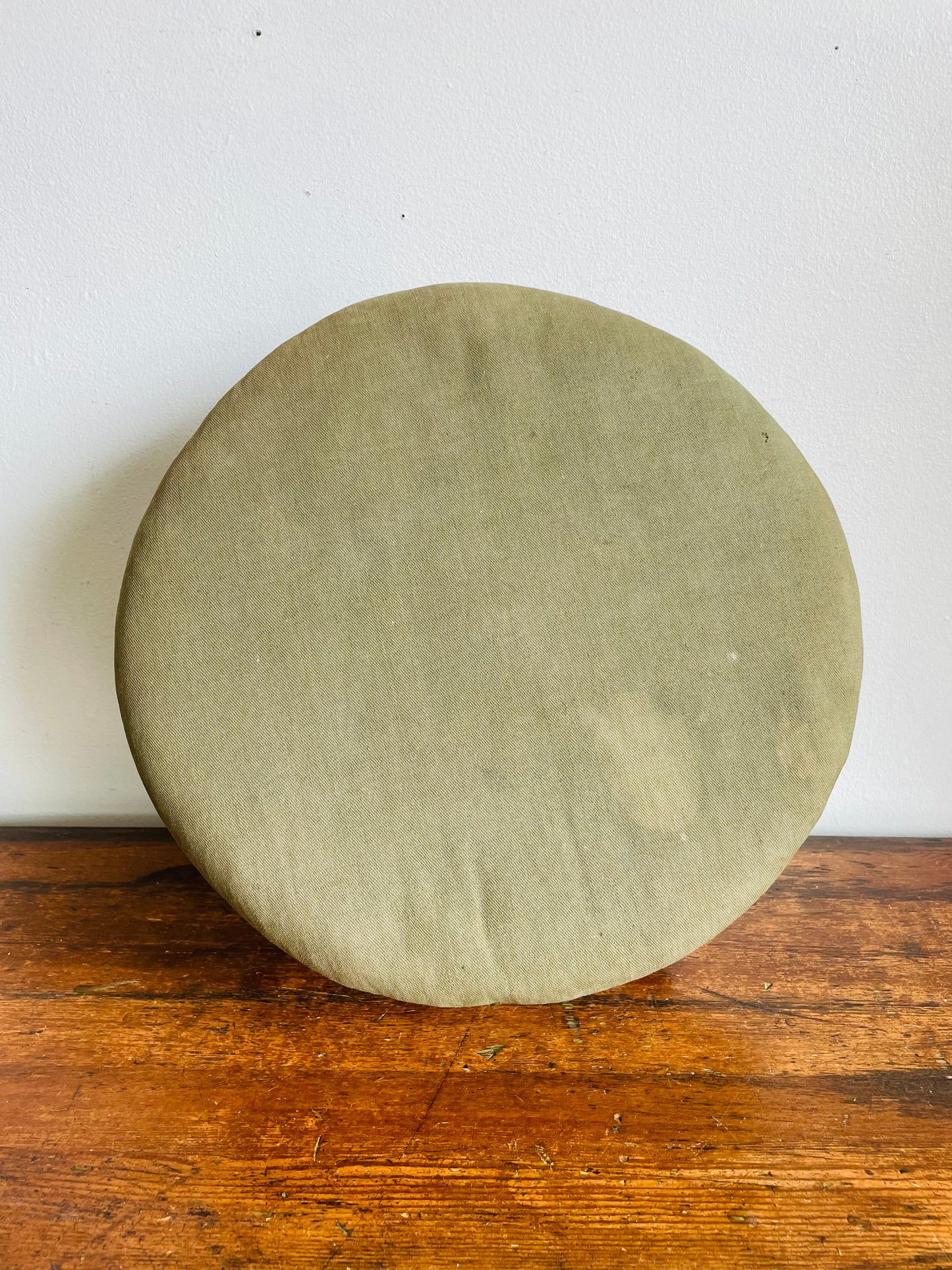 Antique Round Green Straw Stuffed Footstool with Solid Wood Base & Knob Feet