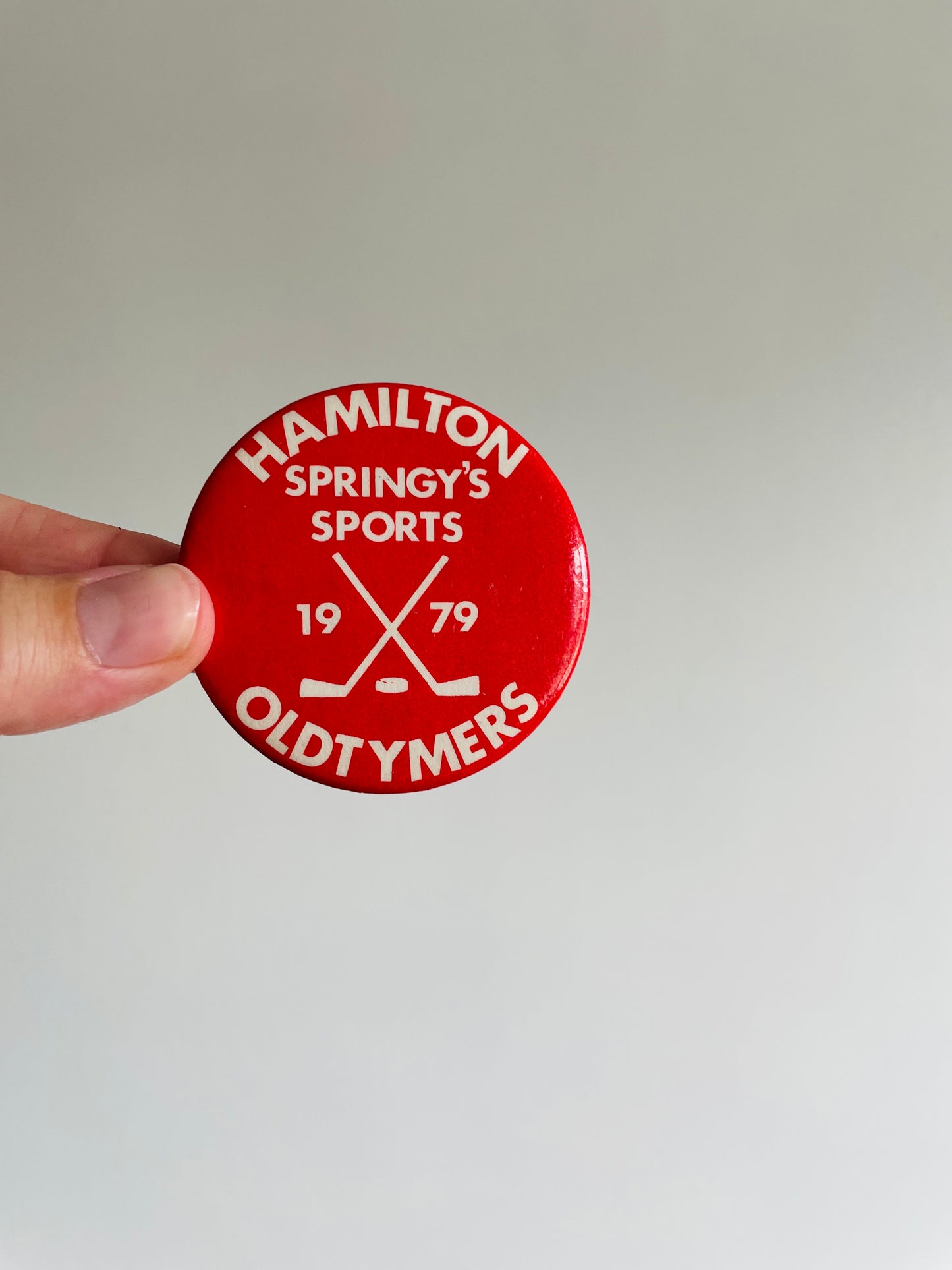 Vintage Metal Hockey Button Pin - Hamilton Oldtymers Springy's Sports 1979 - Red #2