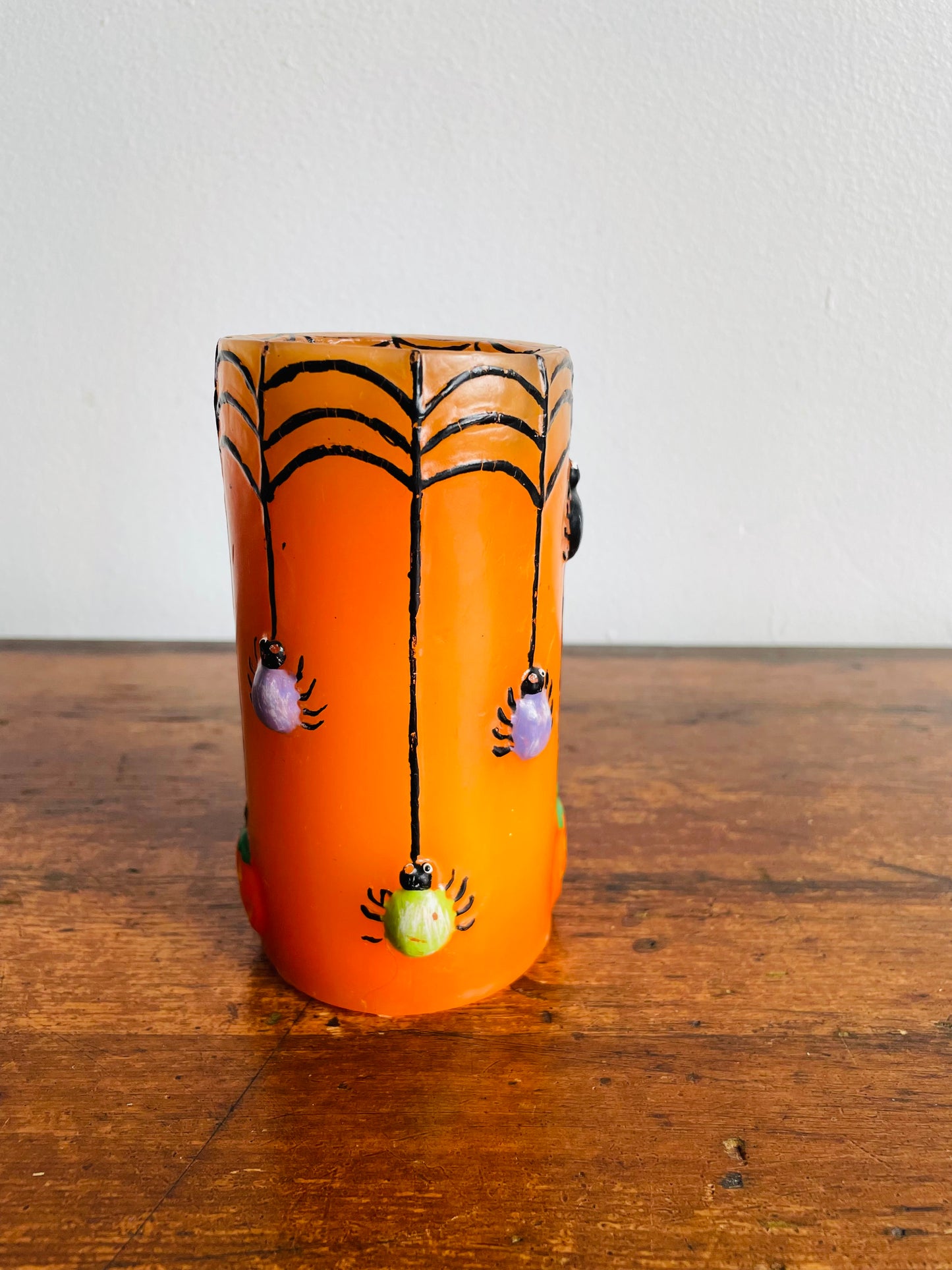 Orange Halloween Candle with Spiders, Web & Jack-o-Lanterns