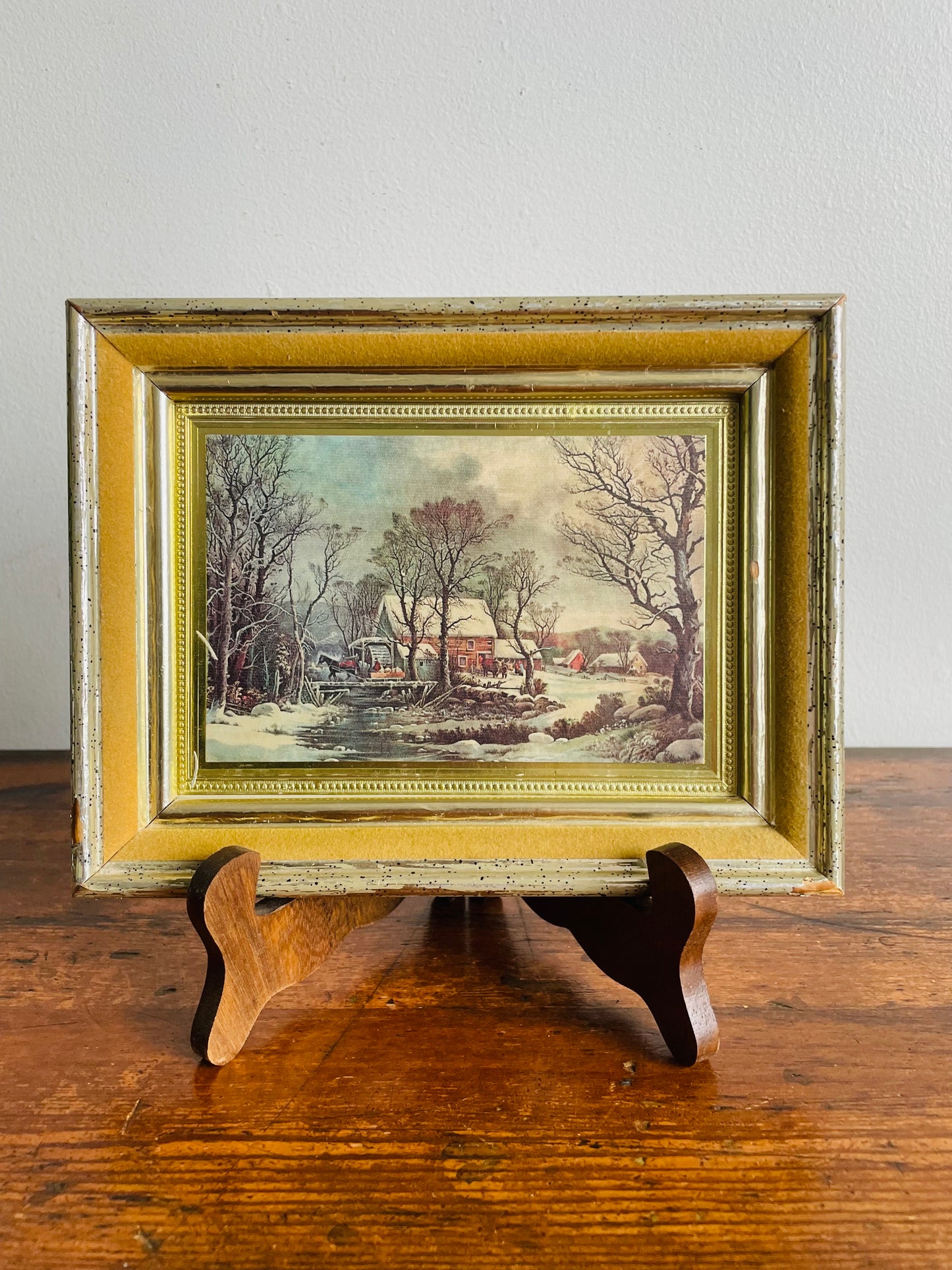 Framed Print of Snowy Farmhouse Scene with Horse Drawn Sleigh Over Bridge