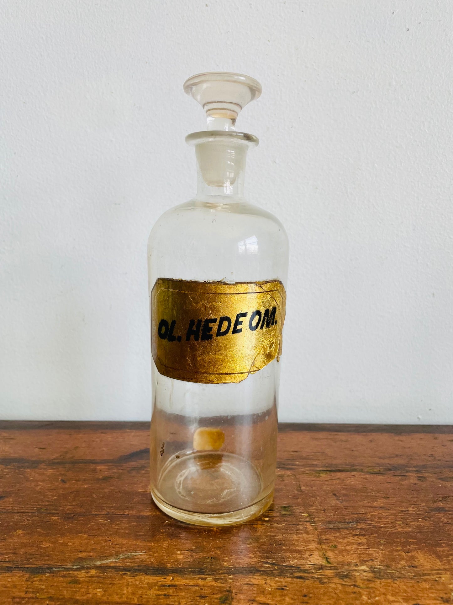 Antique Pharmacy Apothecary Hand Blown Clear Glass Bottle with Lid & Gold Label - Ol. Hedeom