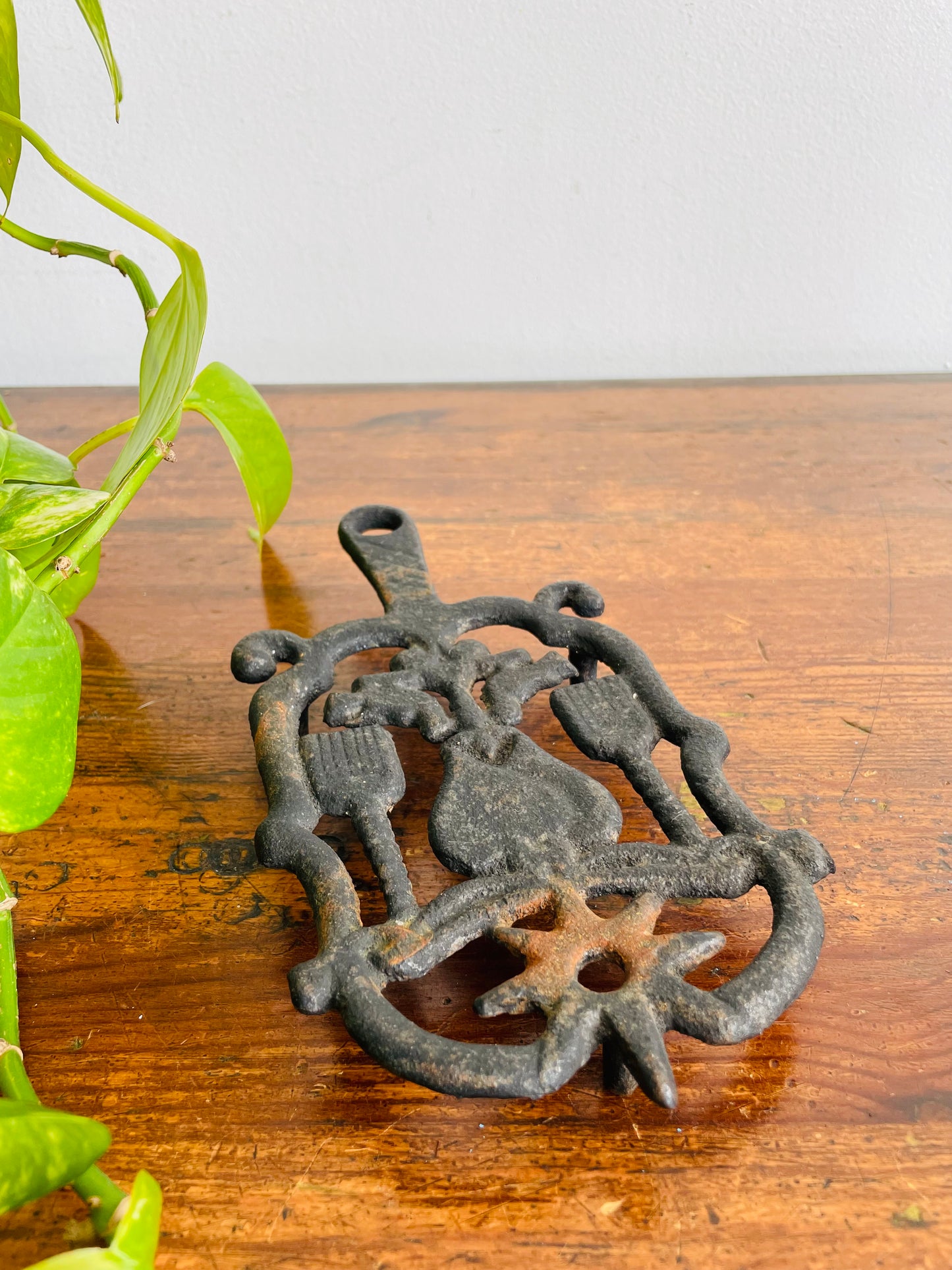 Cast Iron Footed Trivet with Hearts, Brooms, Birds & Star Design