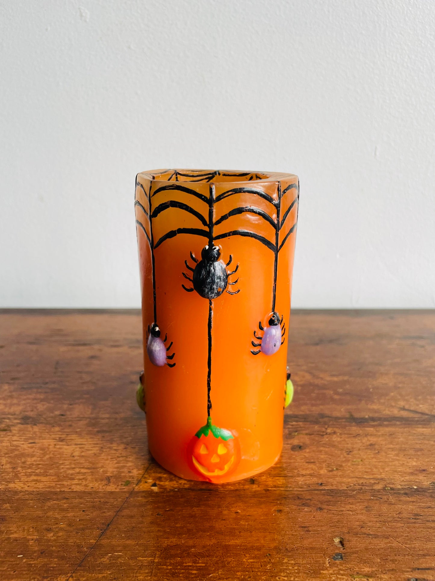 Orange Halloween Candle with Spiders, Web & Jack-o-Lanterns