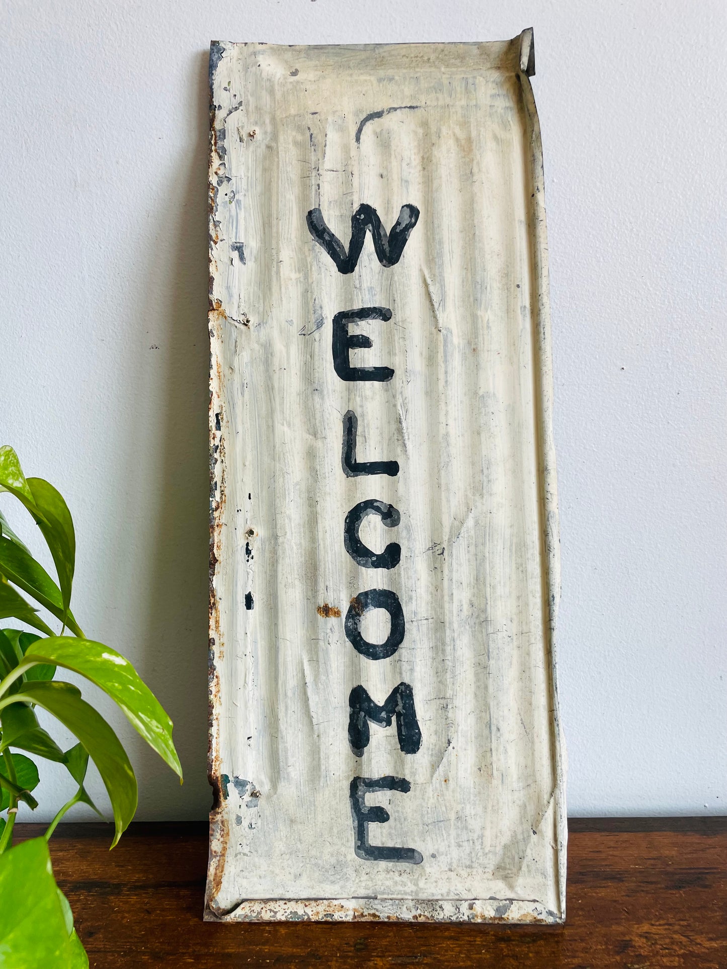 Rustic Hand Painted White & Black Welcome Sign on Metal Background