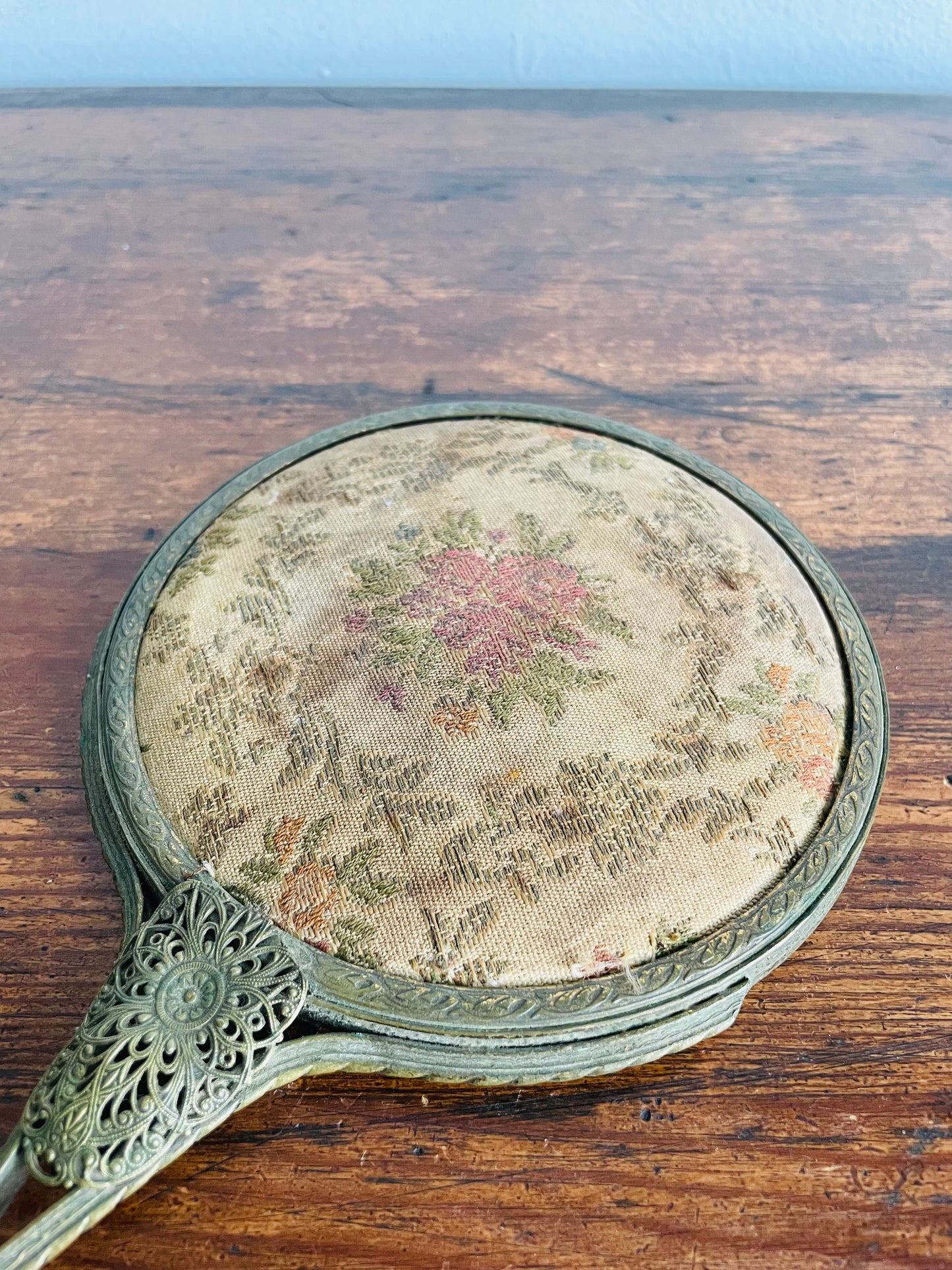 Antique Belle Epoque Handheld Vanity Mirror with Ornate Brass Filigree & Embroidered Floral Tapestry Fabric