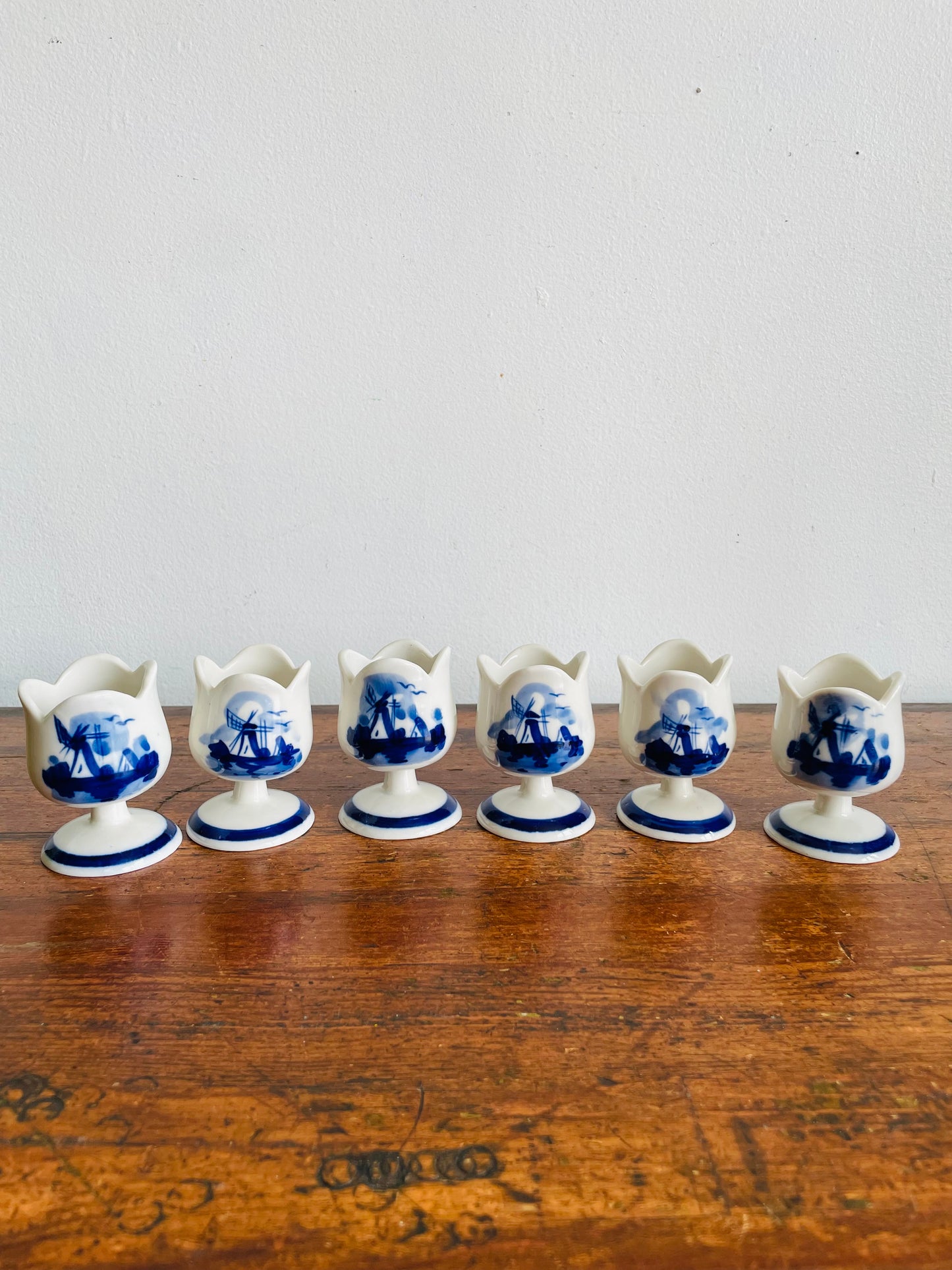 Vintage Hand Painted Delft Blue Tulip Shaped Egg Cup Holders with Flower & Windmill Design - Set of 6