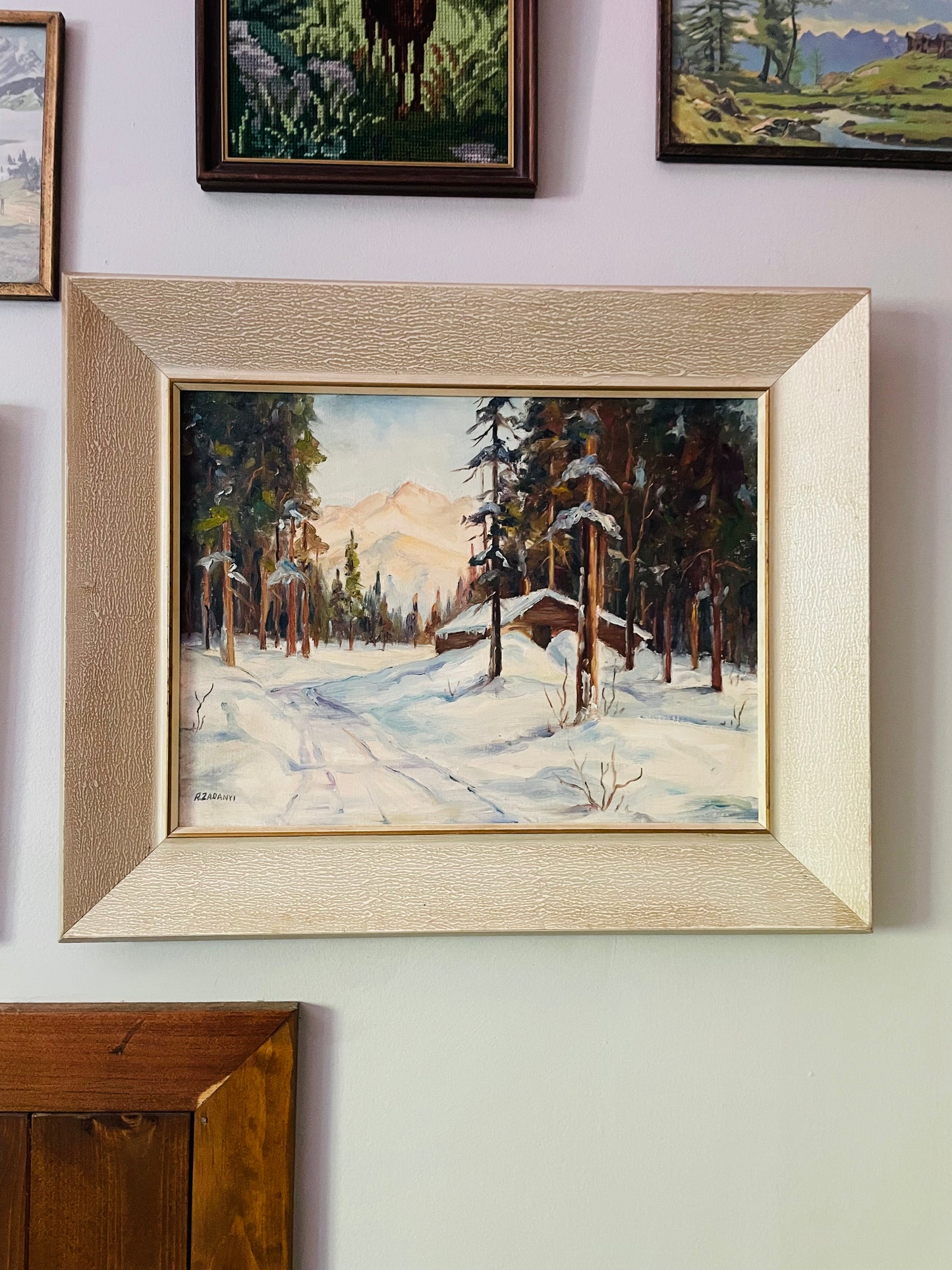 Original Art - Large Framed Painting of Snowy Cabin in Woods with Mountains - Signed R. Zadanyi