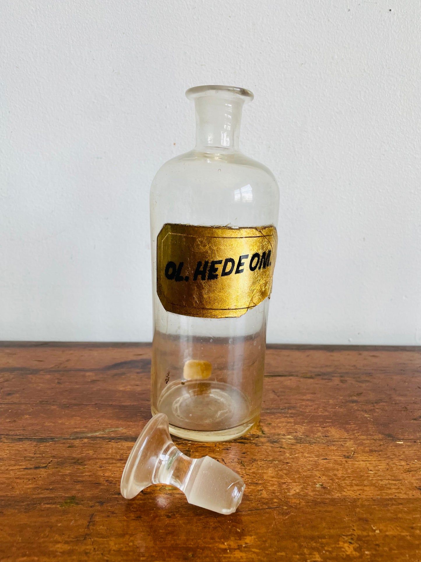 Antique Pharmacy Apothecary Hand Blown Clear Glass Bottle with Lid & Gold Label - Ol. Hedeom