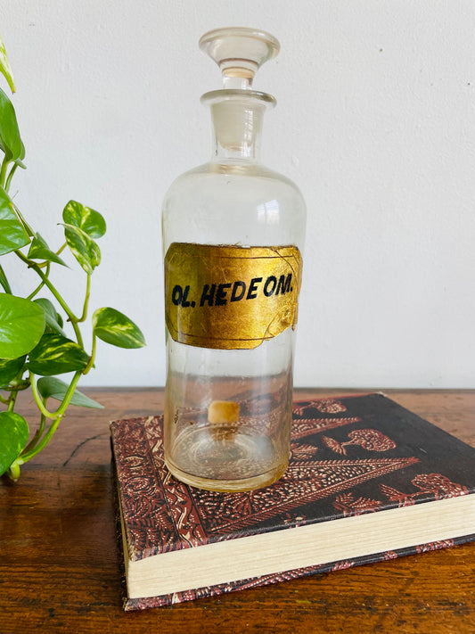Antique Pharmacy Apothecary Hand Blown Clear Glass Bottle with Lid & Gold Label - Ol. Hedeom