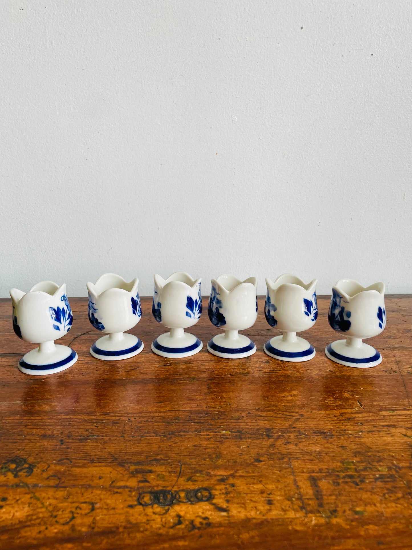 Vintage Hand Painted Delft Blue Tulip Shaped Egg Cup Holders with Flower & Windmill Design - Set of 6