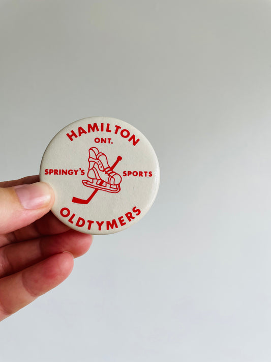Vintage Metal Hockey Button Pin - Hamilton Ont. Oldtymers Springy's Sports - White #1
