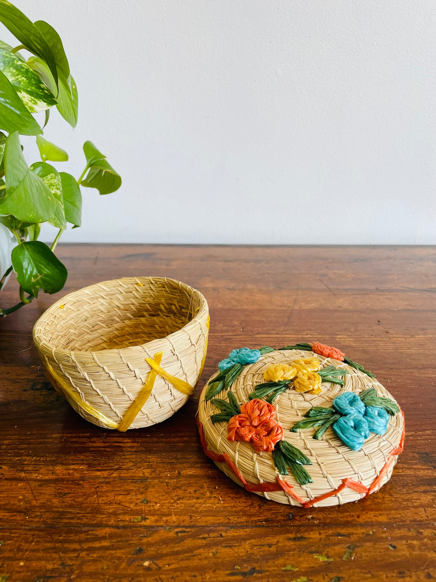 Mini Round Woven Straw Basket with Raffia Flower Design