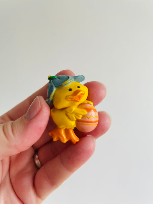 Easter Holiday Pin - Duckling Wearing Flower Hat Holding Egg - Hallmark Cards