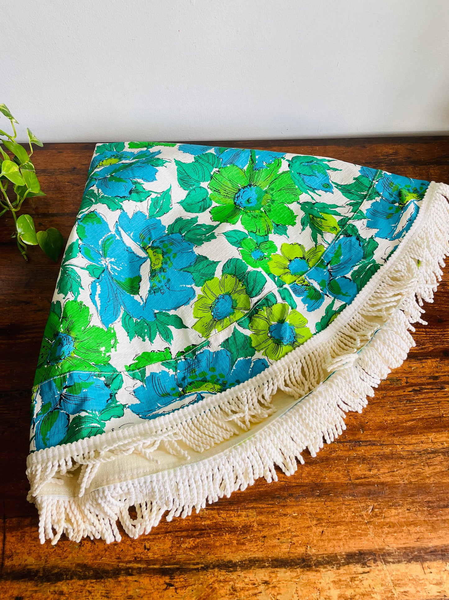 Vintage 1960s/70s Groovy & Fun Green & Blue Flower Power 44" Round Vinyl Patio Tablecloth with Umbrella Hole & White Braided Tassel Fringe